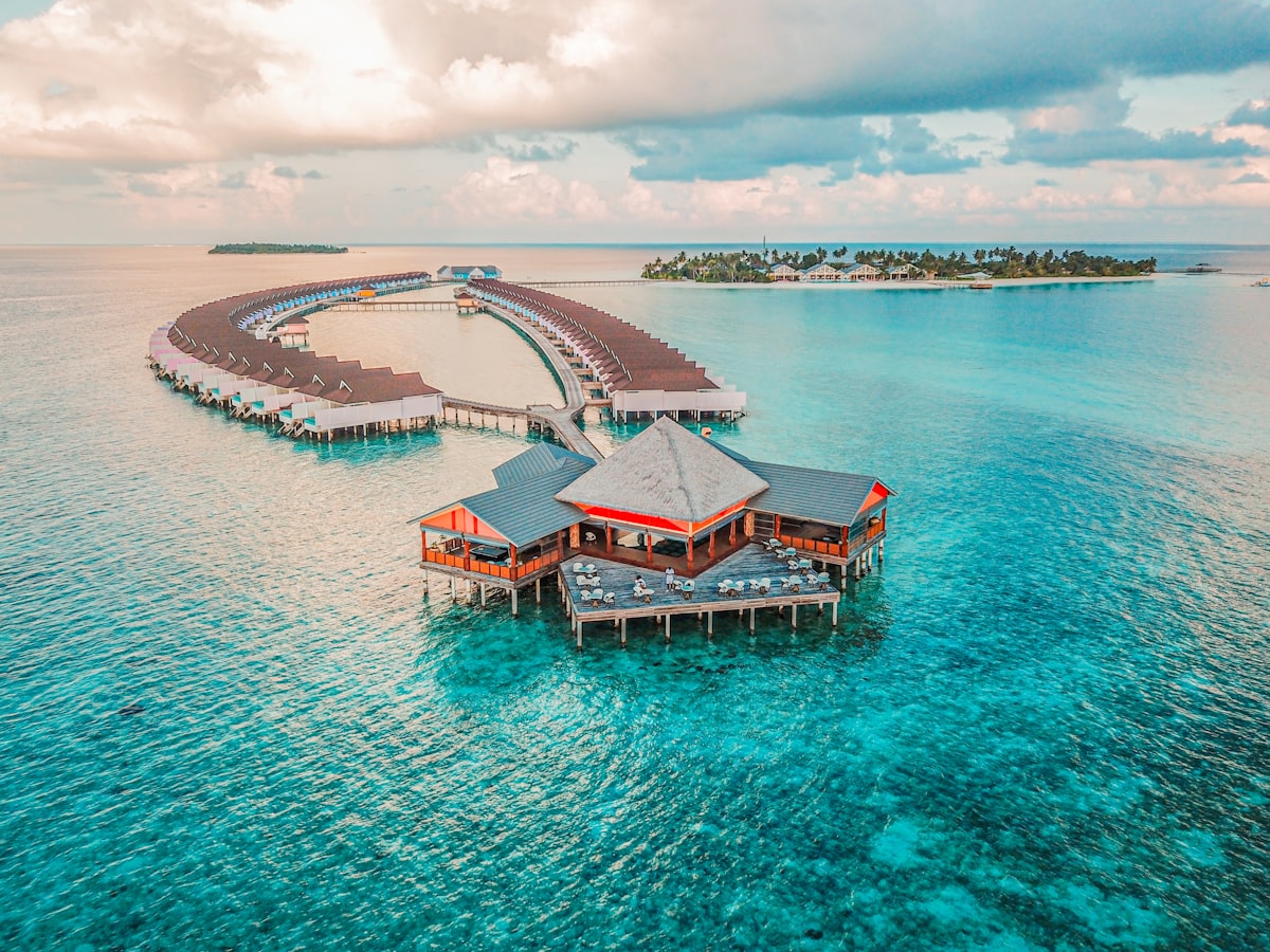 Overwater bungalow with turquoise lagoon in the Maldives