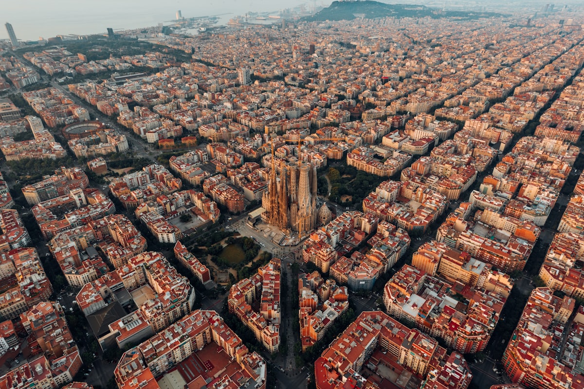 Aerial view of Barcelona beachfront and Sagrada Familia